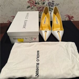 Manolo Blahnik calf white with yellow accent 2” herls. No marks, tears on shoes